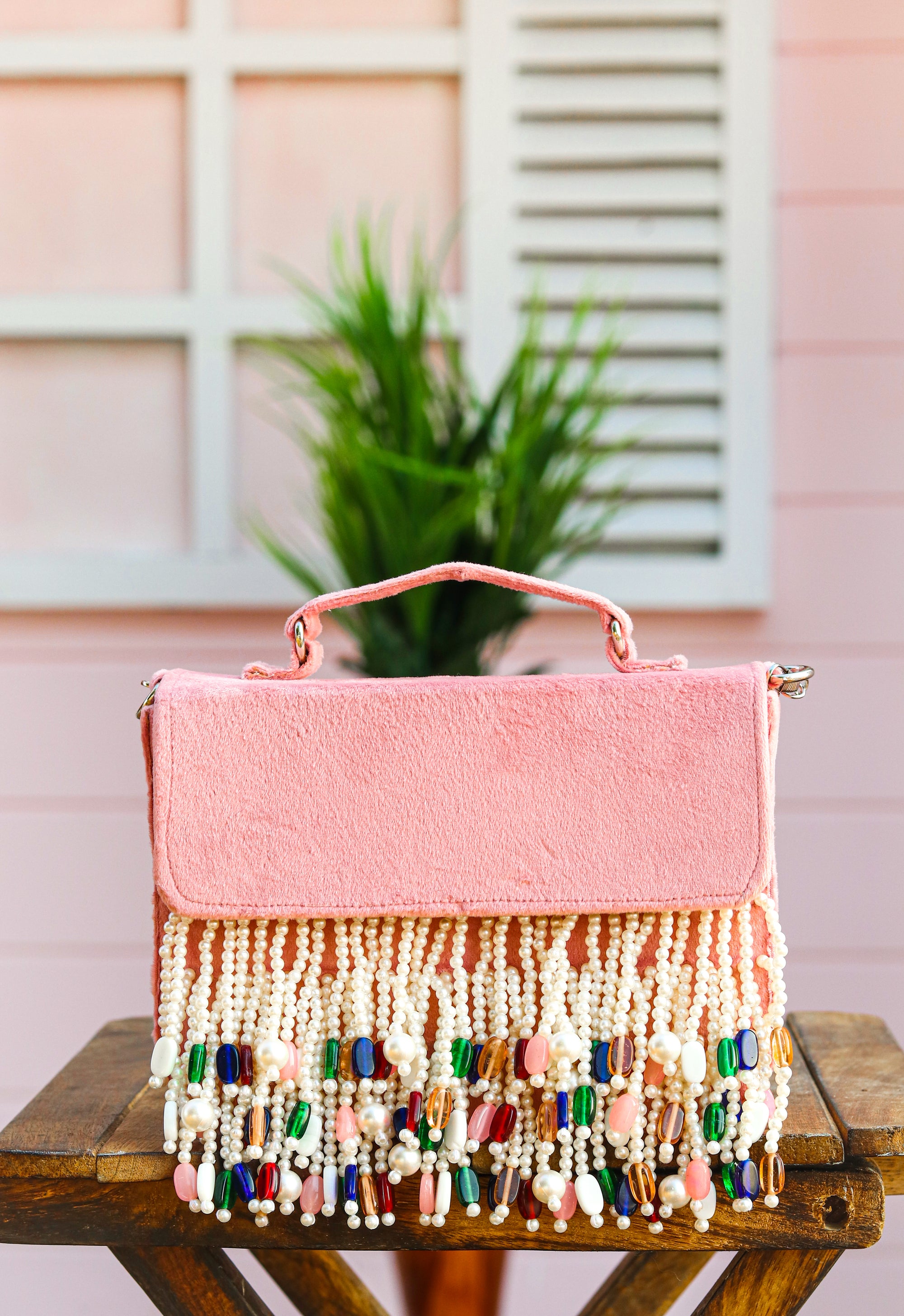 Nidhi_Rathi_Pink_White_Embellished_Tasselled_Purse_Clutch