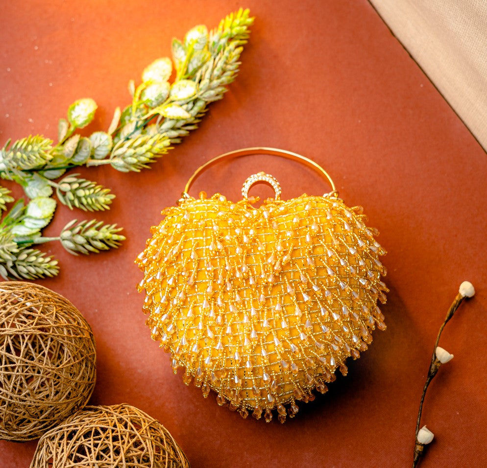 Nidhi_Rathi_Women_Gold-Toned_Embroidered_Tasselled_Box_Clutch