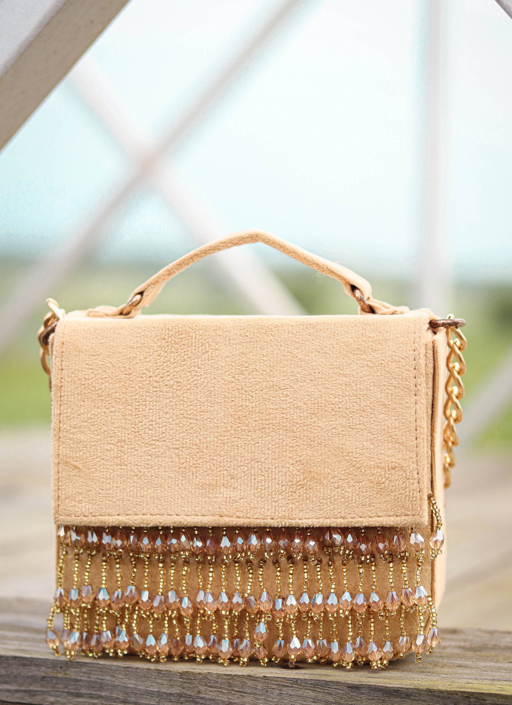 Nidhi_Rathi_Gold-Toned_Off_White_Embroidered_Tasselled_Purse_Clutch