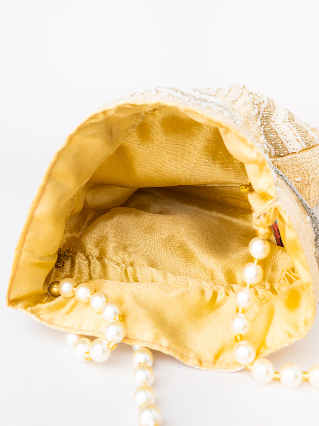 Cream-Coloured_Gold-Toned_Embellished_Potli_Clutch_nidhi_rathi