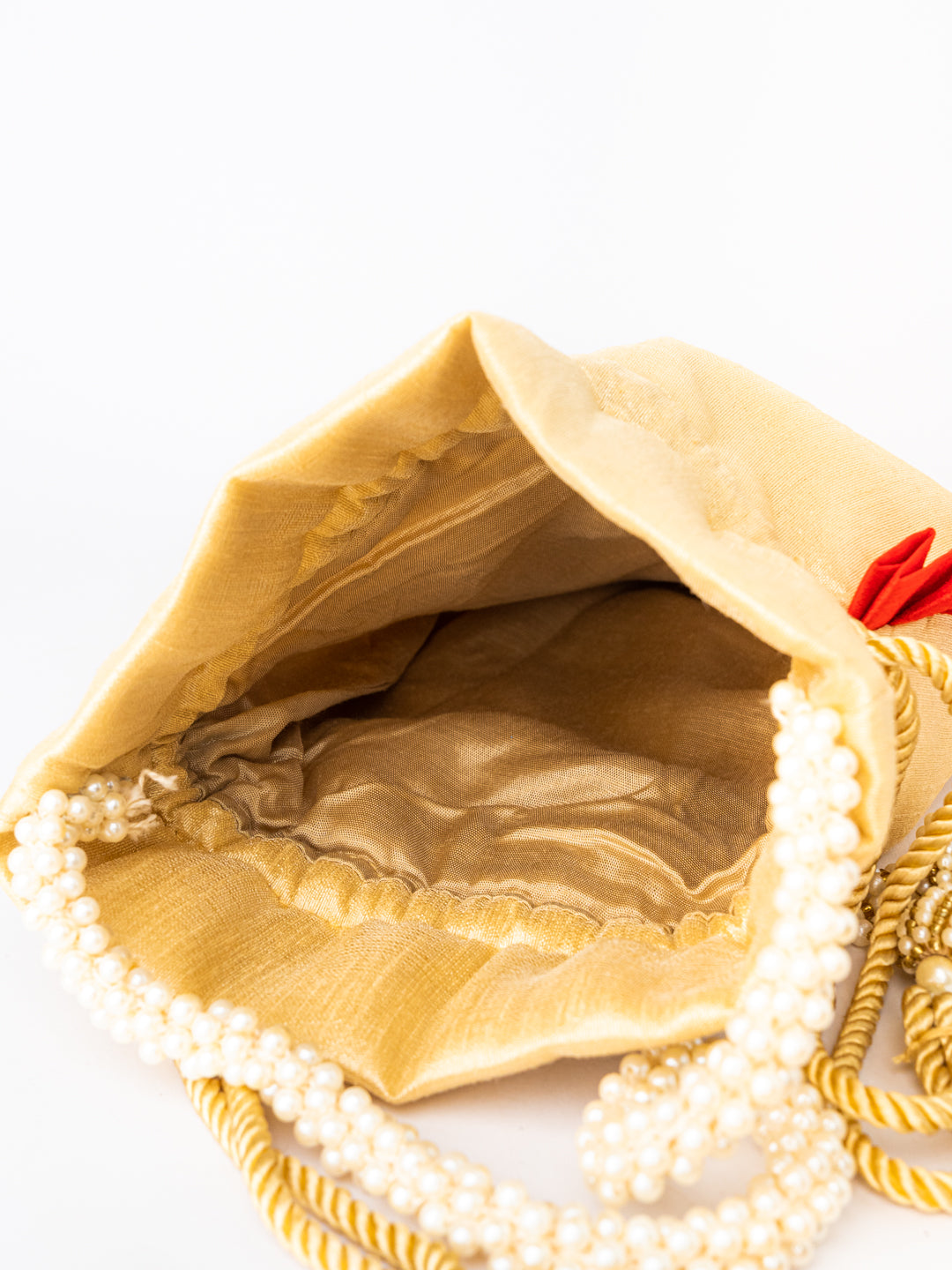 Cream-Coloured_Red_Embroidered_Potli_Clutch_nidhi_rathi