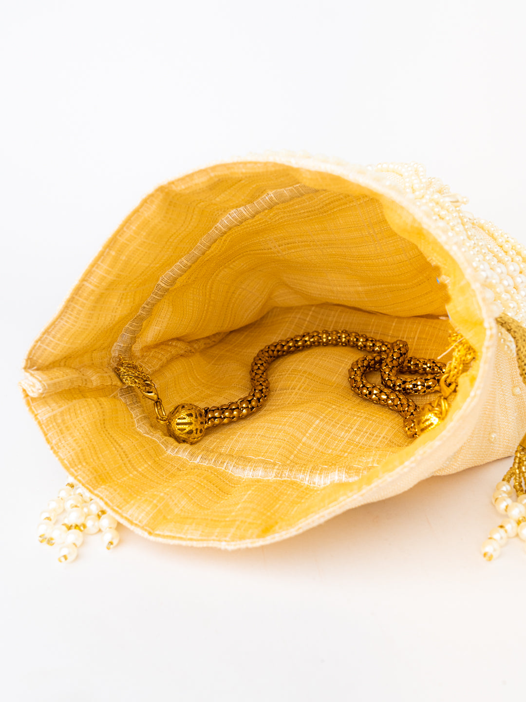 Women_Cream-Coloured_Gold-Toned_Embroidered_Potli_Clutch_nidhi_rathi