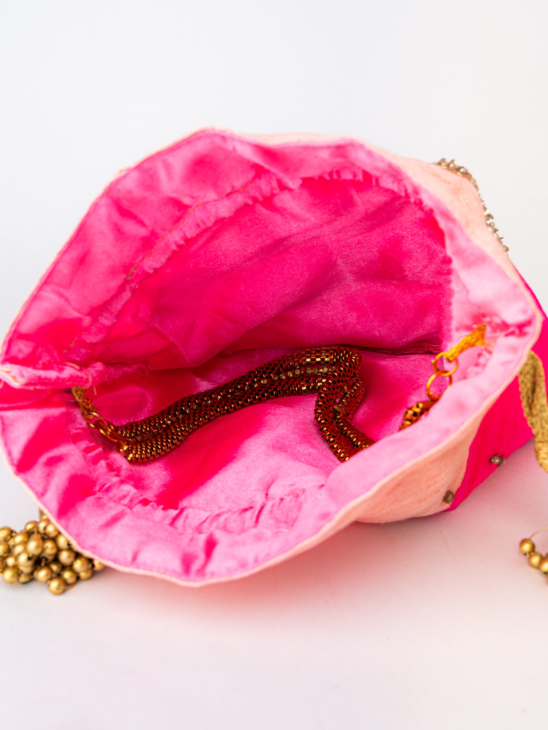 Pink_Gold-Toned_Embroidered_Potli_Clutch_nidhi_rathi