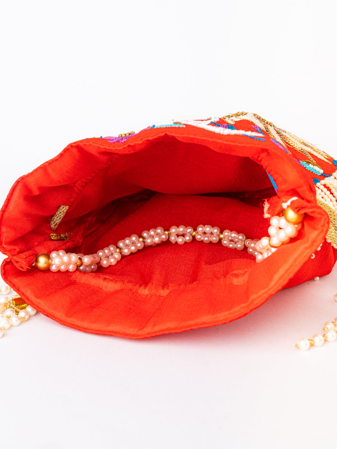 Women_Red_Embroidered_Potli_Bag
_nidhi_rathi