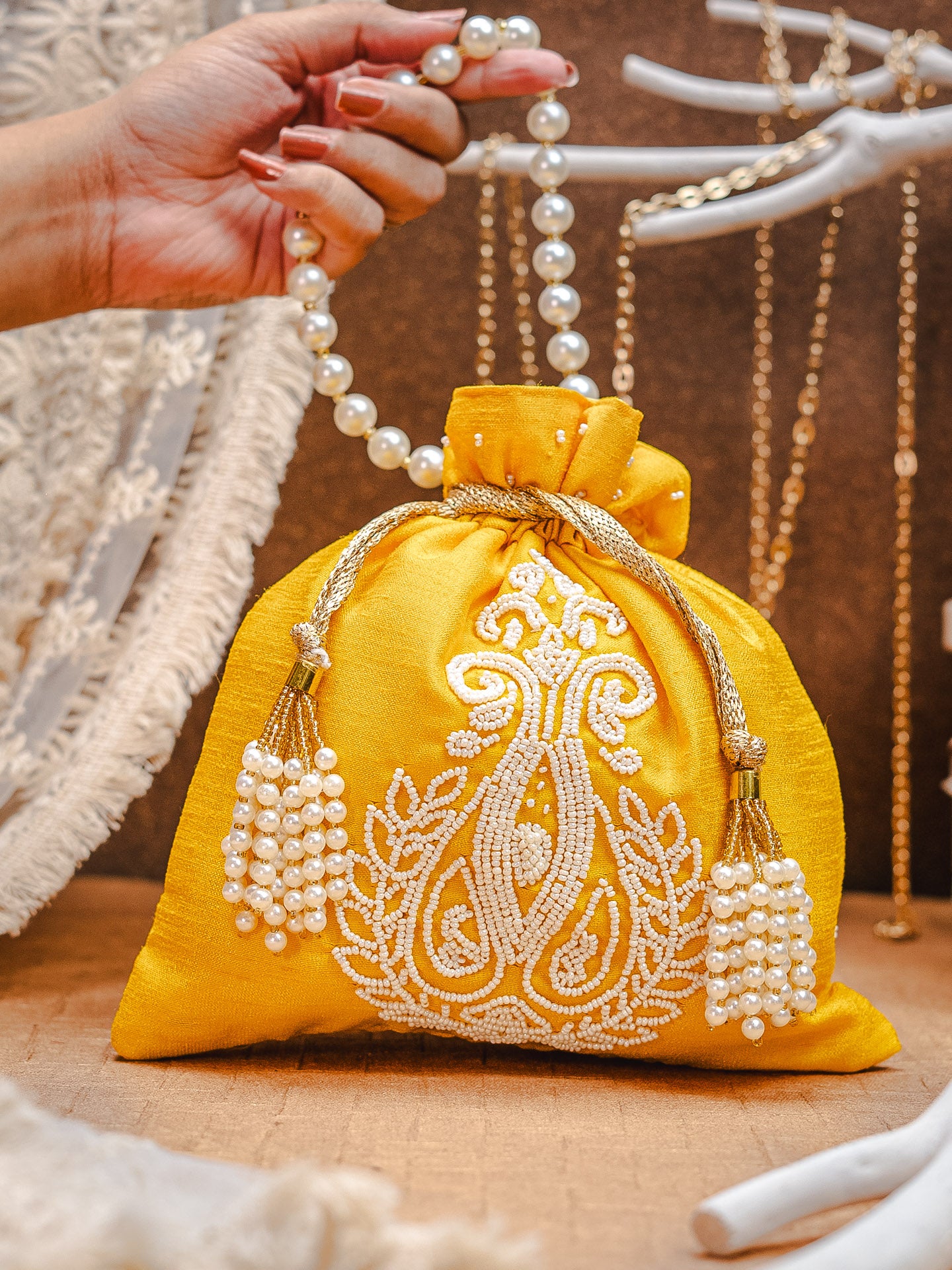 Ethnic Motifs Embroidered Potli Clutch