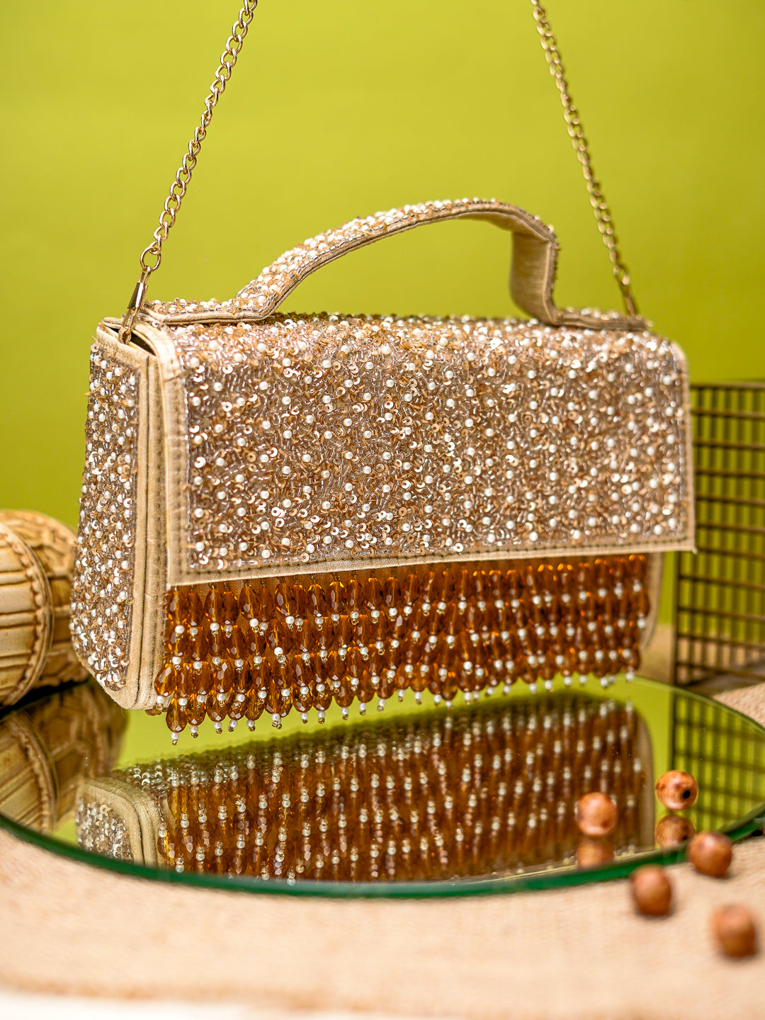 Nidhi_Rathi_Gold_Tasselled_Flap_Bag