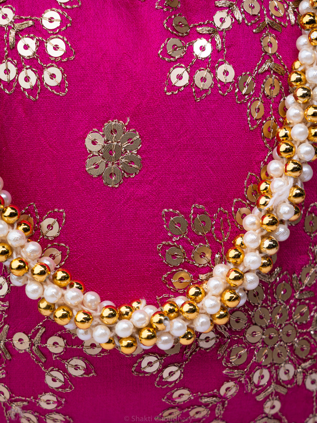 Pink_Gold-Toned_Embroidered_Embroidered_Potli_Clutch_nidhi_rathi