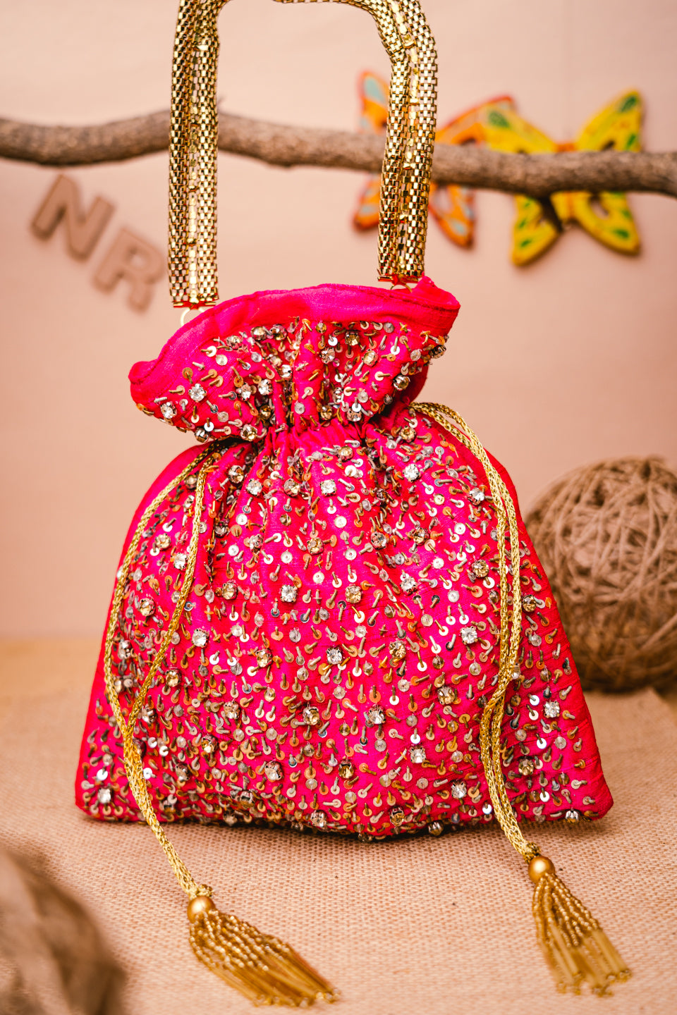 Pink_&_Gold-Toned_Embroidered_Potli_Clutch_nidhi_rathi