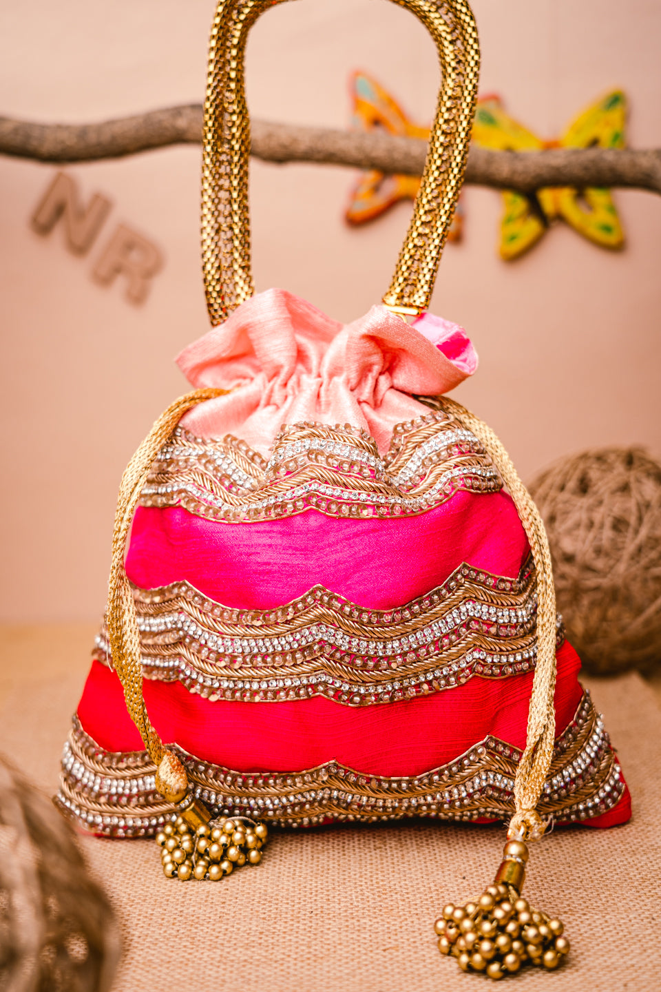 Pink_Gold-Toned_Embroidered_Potli_Clutch_nidhi_rathi
