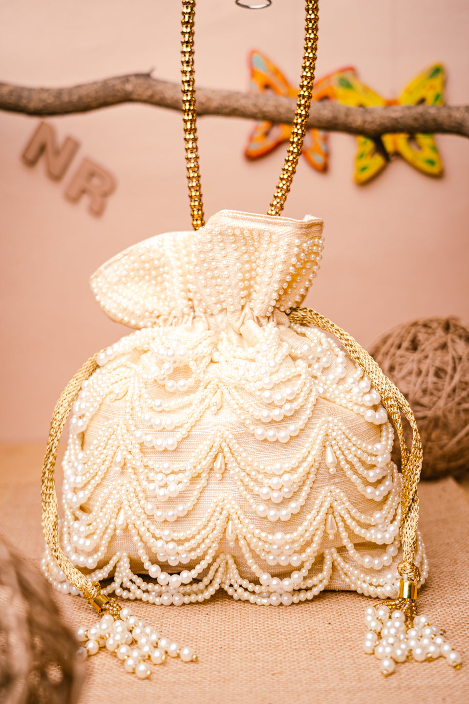 Women_Cream-Coloured_Gold-Toned_Embroidered_Potli_Clutch_nidhi_rathi
