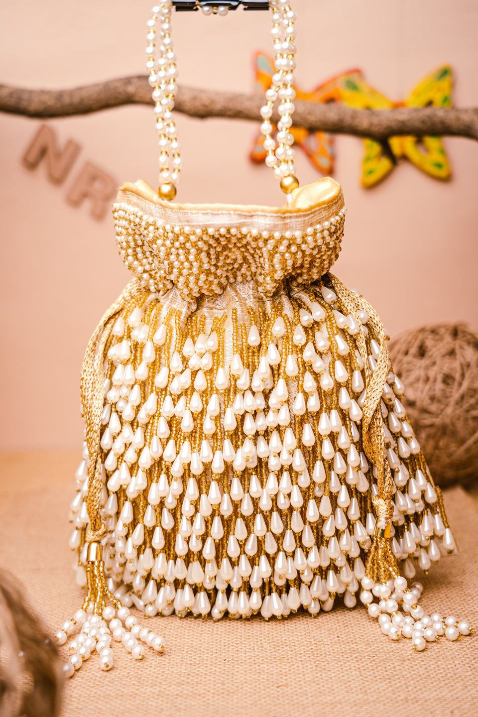Cream-Coloured_White_Embellished_Potli_Clutch_nidhi_rathi