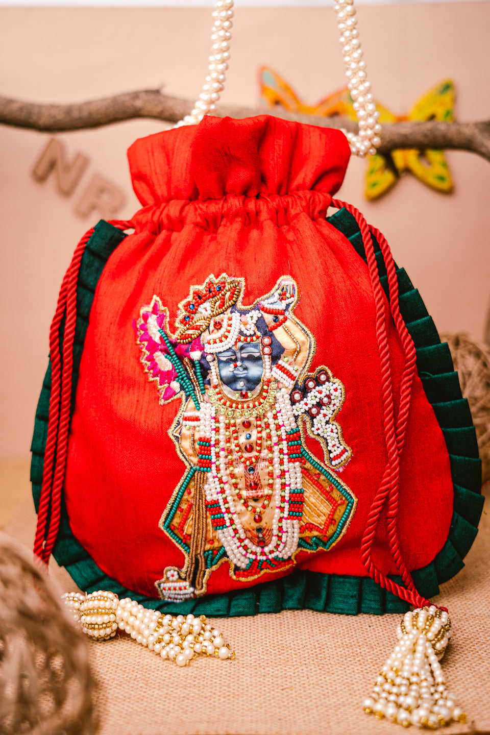 Women_Red_Green_Embroidered_Potli_Clutch
_nidhi_rathi