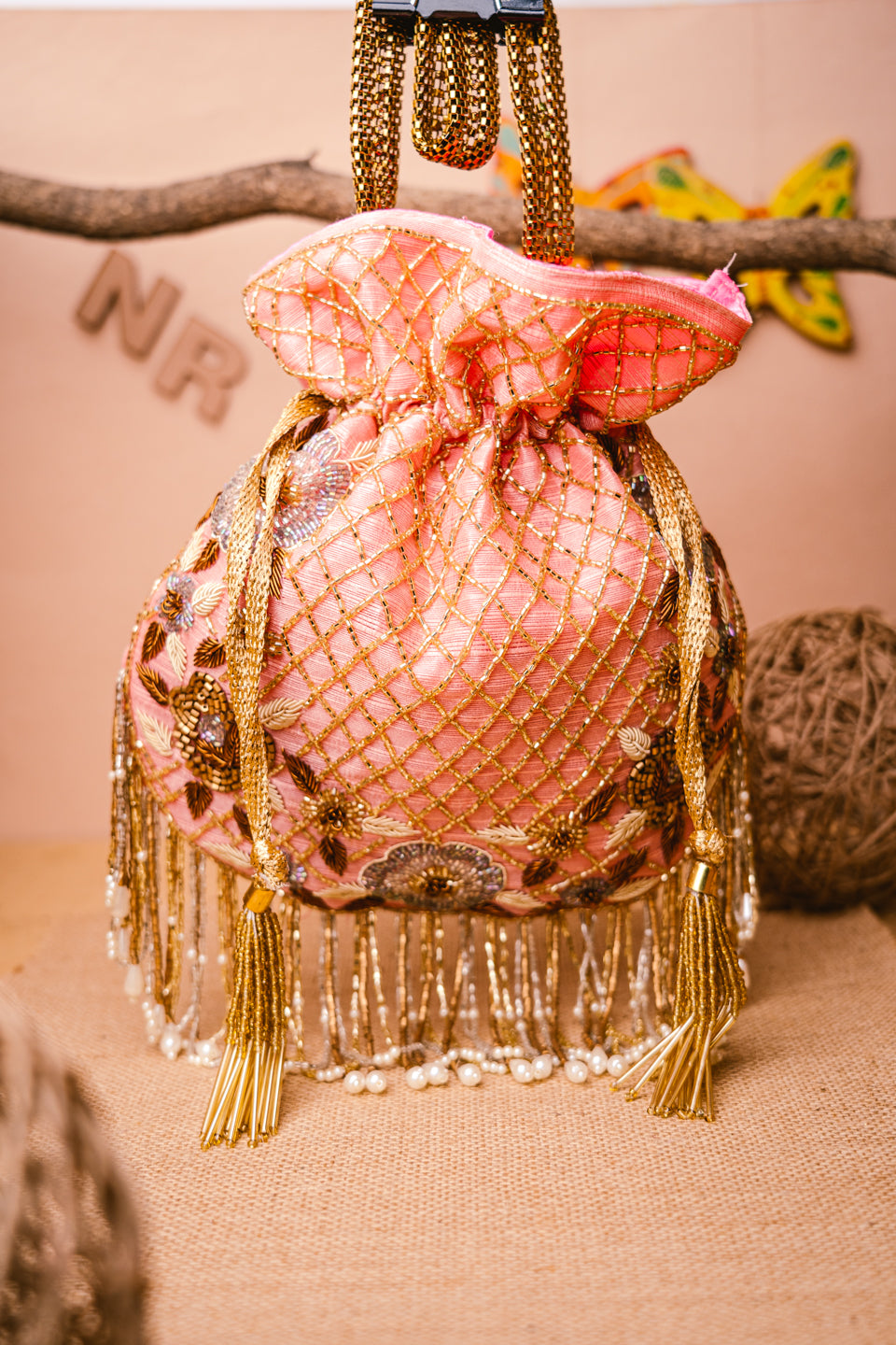 Rose_Gold-Toned_Embroidered_Quilted_Potli_Clutch_nidhi_rathi