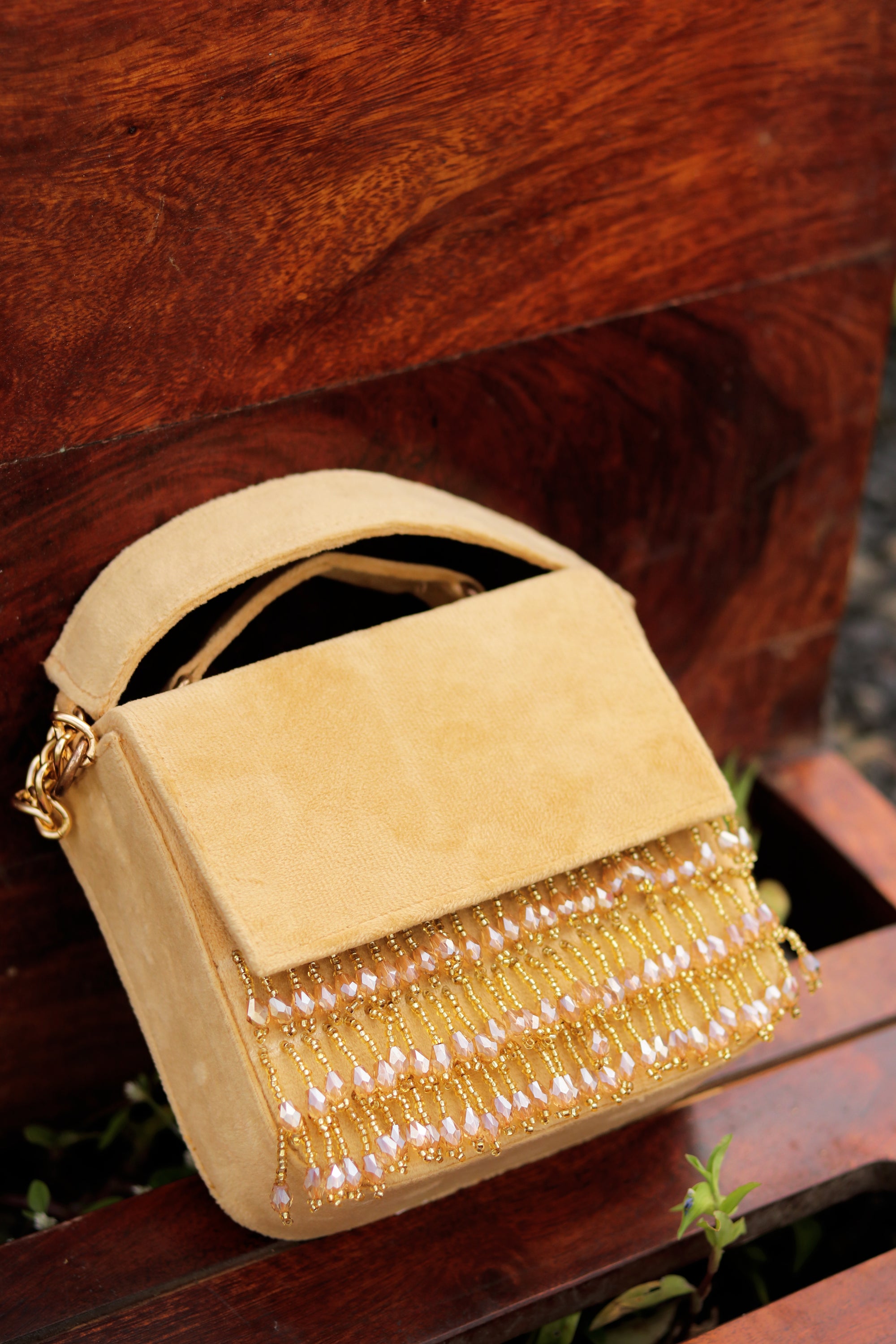Nidhi_Rathi_Gold-Toned_Off_White_Embroidered_Tasselled_Purse_Clutch